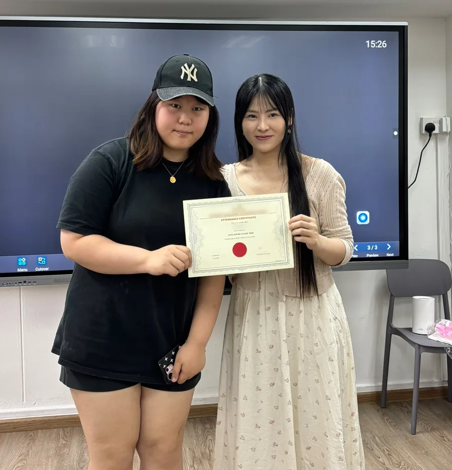 Qing Nuo with Miss Melissa on her last day